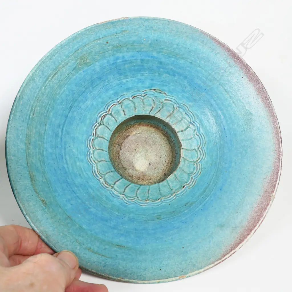 Two Graeme Storm pottery pieces - both with faults, turquoise glazed footed bowl with central well, small chip and glaze loss to rim, dia.200mm. Ovoid vase with lug handle, chip to lip and star crack to base, 150mm. Potter's mark to base of both. Image 1++