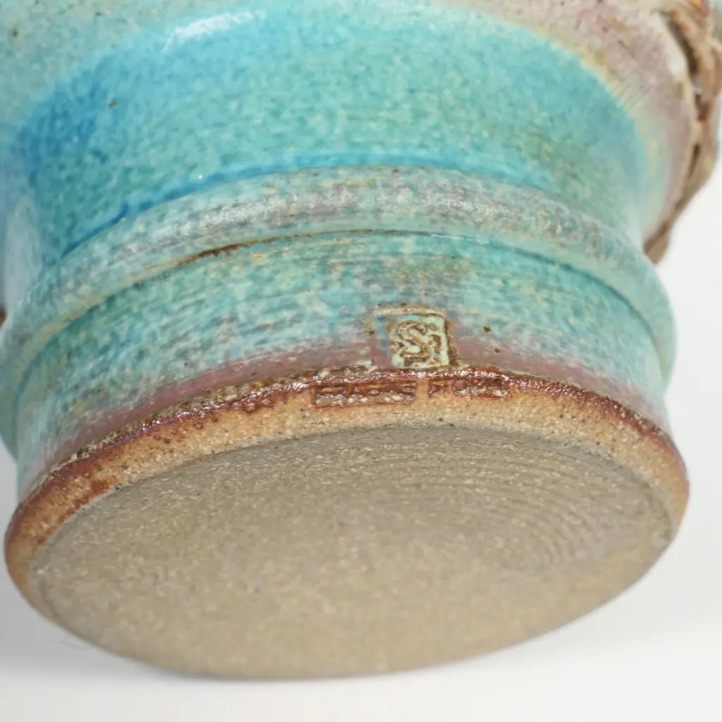 Graeme Storm blue urn vase; variable blue glazed body with applied ribbed straps. Potter's mark to foot. H.160mm Image 1++