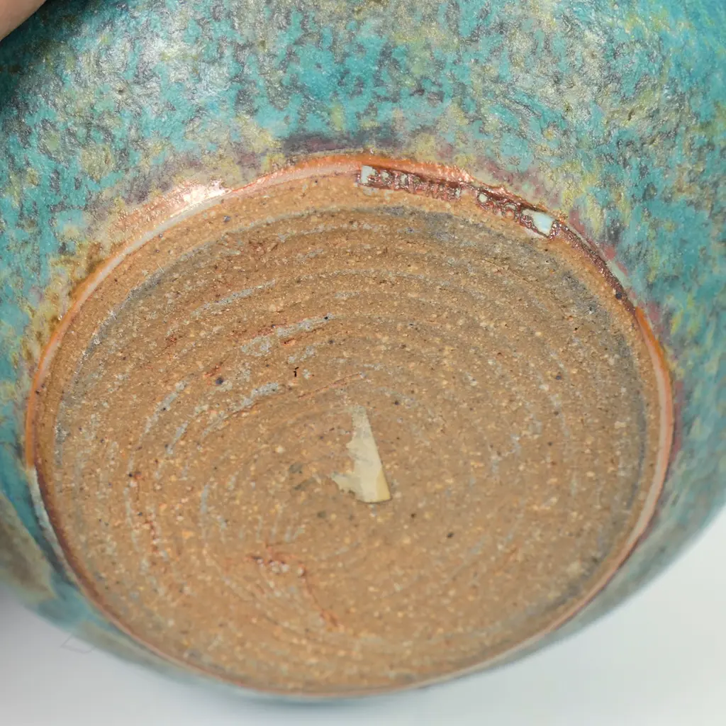 Graeme Storm small ovoid vase with a semi-gloss turquoise glaze. Impressed potter's mark. H.120mm Image 1++