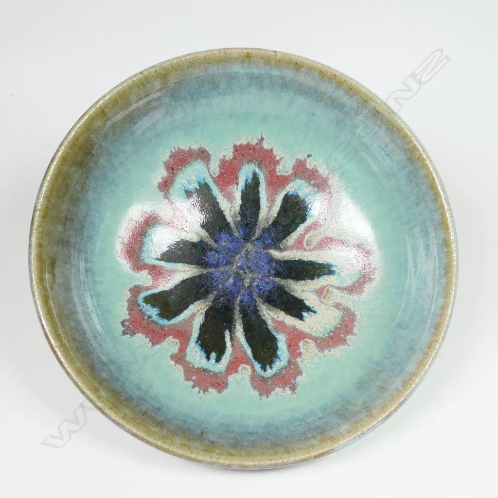 Graeme Storm footed bowl - pale turquoise glazed with internal pink and blue radiating floral motif. H.60 dia 200mm Image 1++