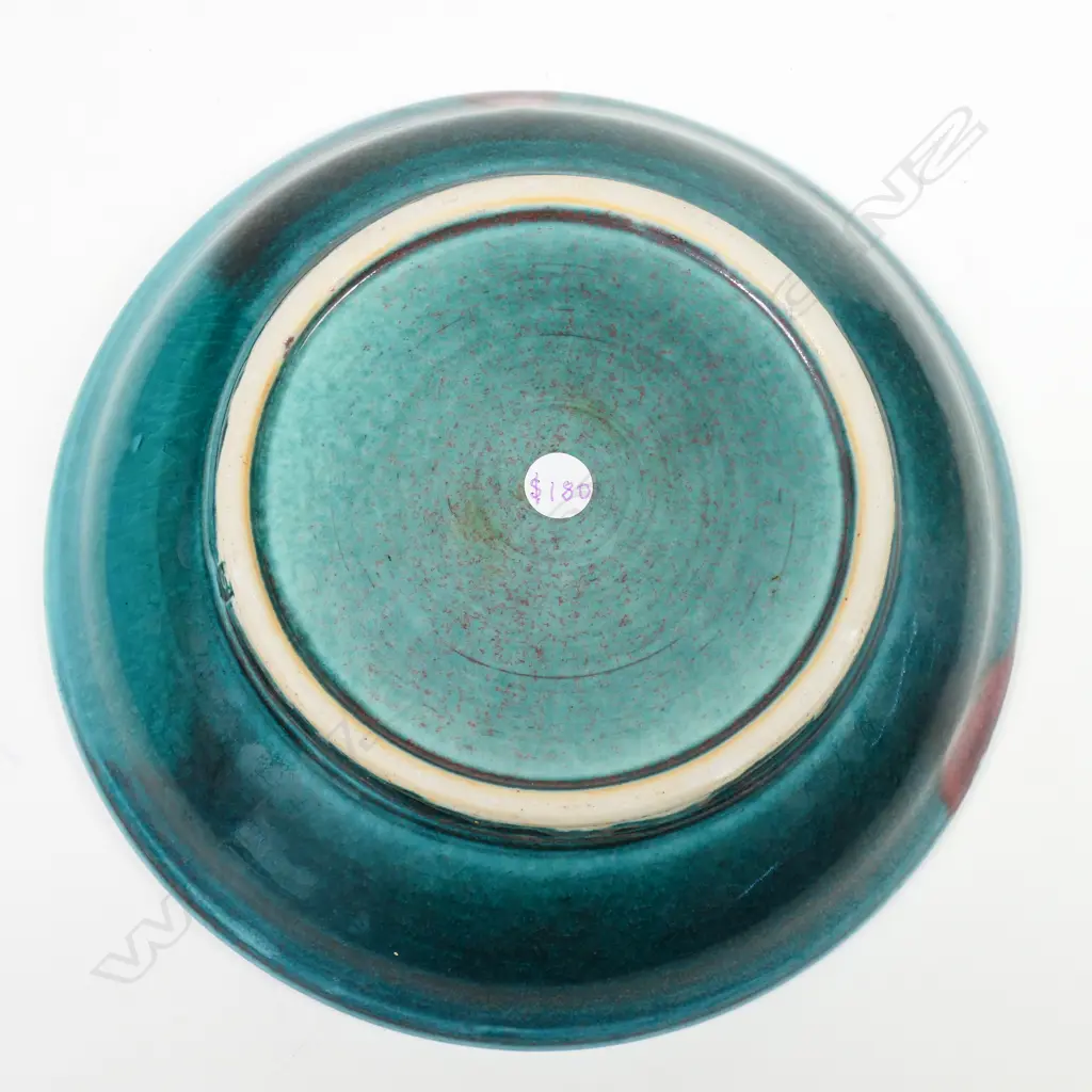 Graeme Storm shallow footed bowl -  green underglaze with sweeps of red copper glaze. Potter's stamp to foot. Dia.210mm Image 1++