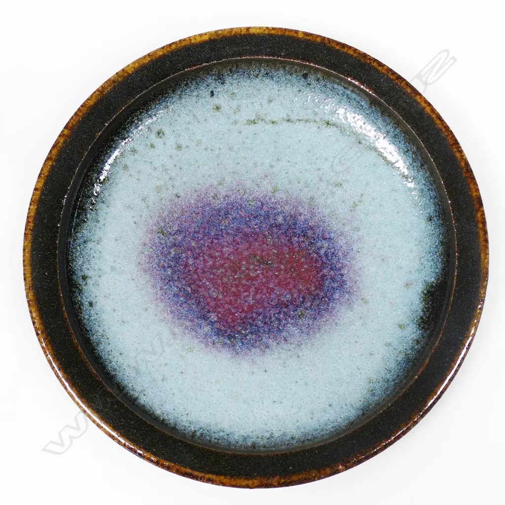 Graeme Storm tenmoko glazed small dish with a pale chun and copper center and raised sides. Potter's mark to foot. Dia.140mm Image 1++
