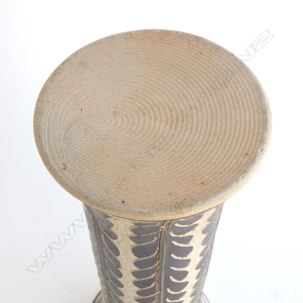 Graeme Storm tall mildly flared vase with sgraffito cut slip floral decoration. Small repaired chip under top lip. Impressed potter's mark. H.380mm. Vendor's note: Bought directly from the potter. Image 1++