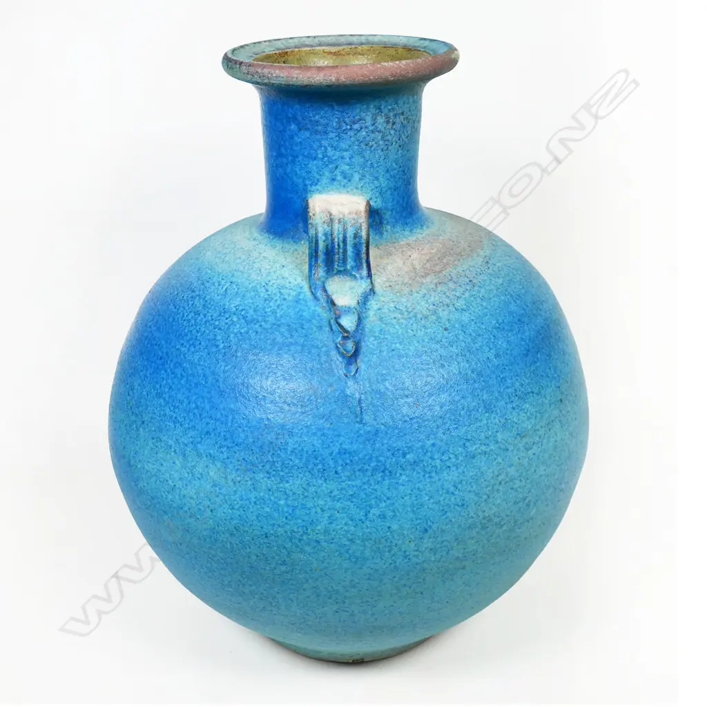 Graeme Storm large stoneware vase with lug handle barium blue glazed body in graduated blue tones and a flattened lip atop neck. Potter's mark to foot. H.320mm Image 1++