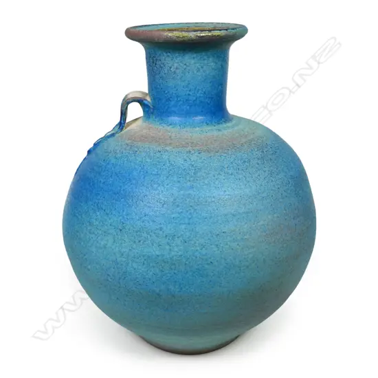 Graeme Storm large stoneware vase with lug handle barium blue glazed body in graduated blue tones and a flattened lip atop neck. Potter's mark to foot. H.320mm