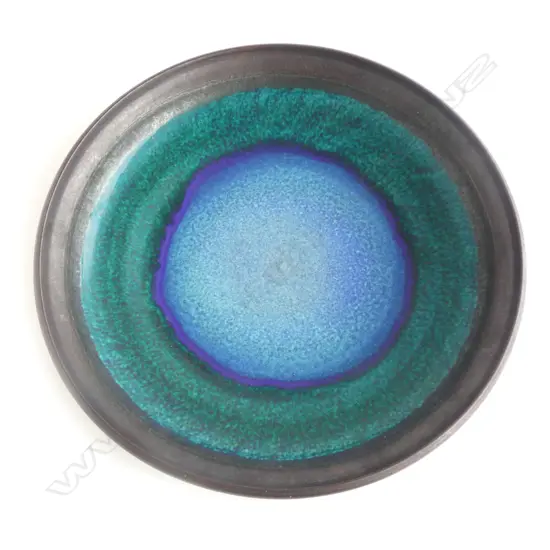 Graeme Storm large shallow stoneware dish with central blue, green & black transitioning rings and blue-black exterior. Potter's mark to foot. Dia.450mm