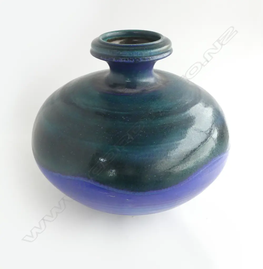 Graeme Storm large squat spherical stoneware vase - c.1970/80's, green over blue/mauve glaze with wavy glaze intersection. Impressed potters mark. H.330mm. Image 1++