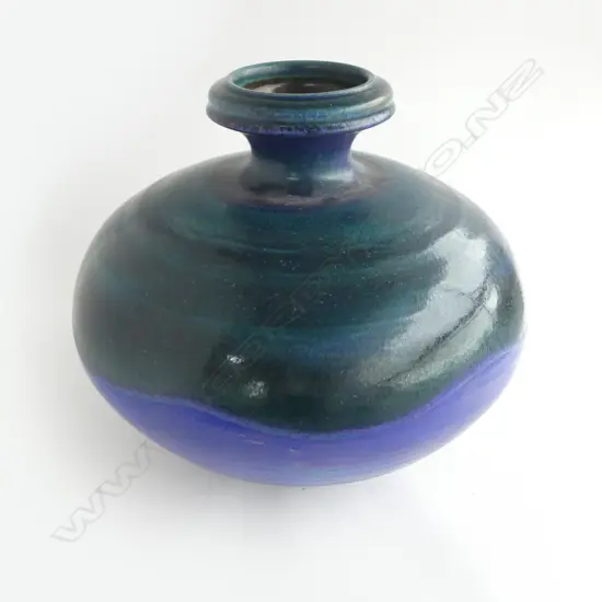 Graeme Storm large squat spherical stoneware vase - c.1970/80's, green over blue/mauve glaze with wavy glaze intersection. Impressed potters mark. H.330mm.