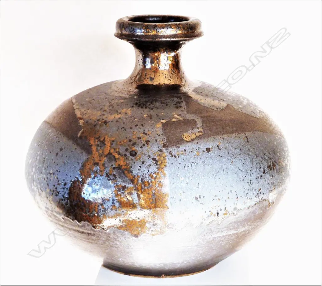Graeme Storm large stoneware vase - compressed wide spherical form, manganese glaze with dark gloss gold highlights, impressed potters mark. H.360mm. Image 1++