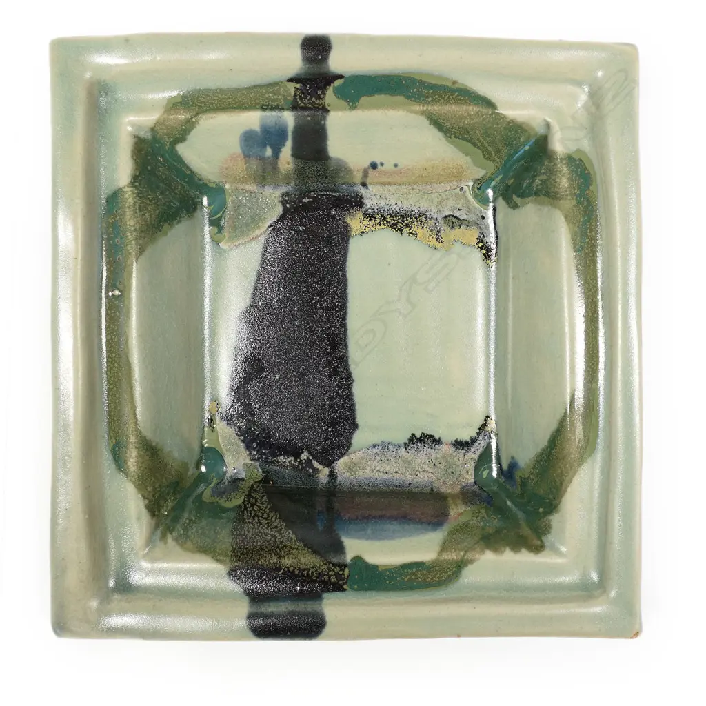 Doreen Blumhardt square platter with abstract poured coloured glaze. Flared rim. Raised on bracket feet Impressed potter's mark. 250 x 250mm. Image 1++