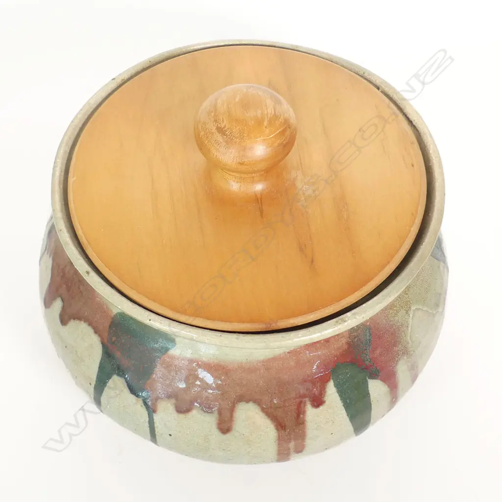 Doreen Blumhardt (1914-2009) large stoneware potato pot with turned wooden lid; wide squat baluster body with coloured dribbled glaze below the rim. 310 x 360mm. Provenance: Ex. The estate of Eleanor Blumhardt - the potter's sister. Image 1++