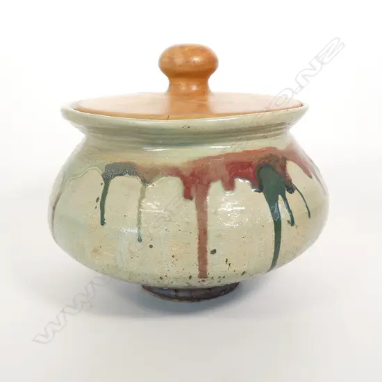 Doreen Blumhardt (1914-2009) large stoneware potato pot with turned wooden lid; wide squat baluster body with coloured dribbled glaze below the rim. 310 x 360mm. Provenance: Ex. The estate of Eleanor Blumhardt - the potter's sister.
