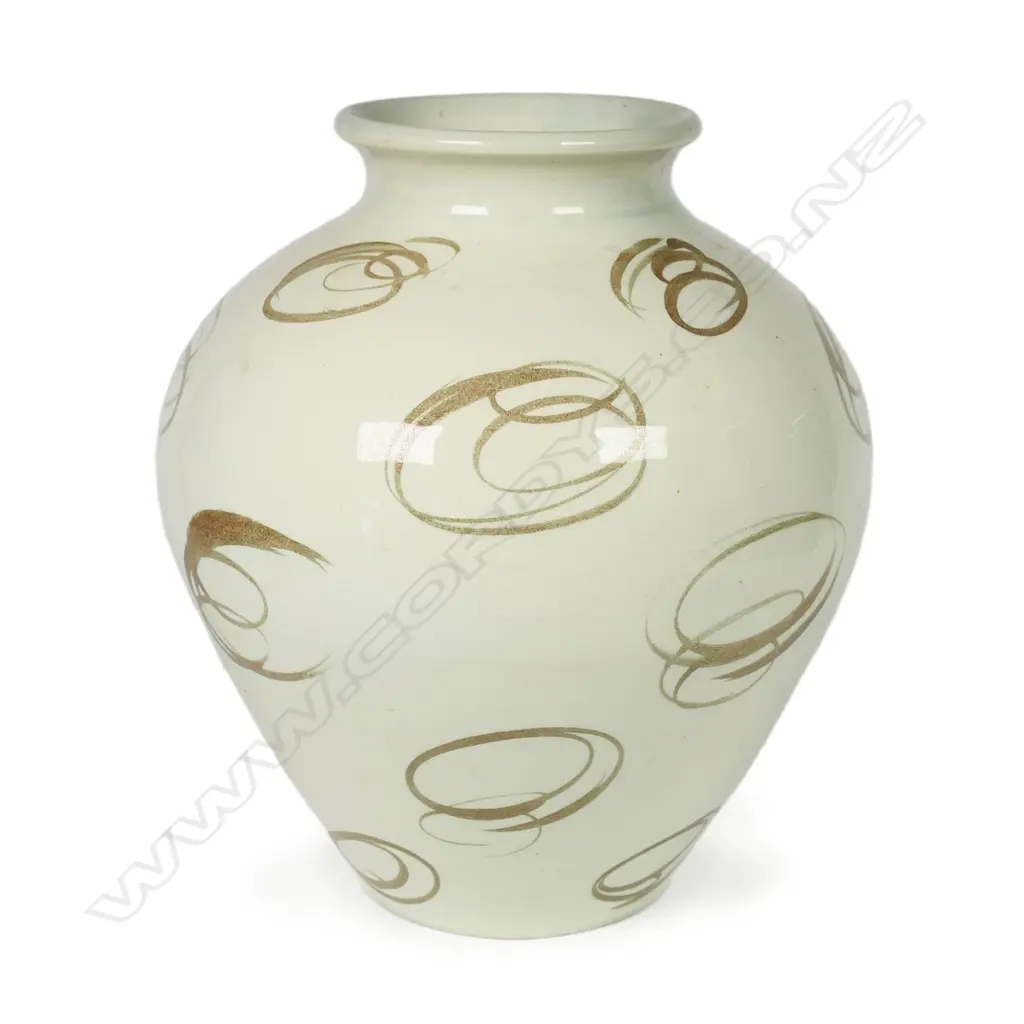 Frank Carpay for Crown Lynn HANDWERK vase - ovoid shape with gold swirls on a cream ground. Tiki mark and HANDWERK to base. Star crack to base. H.200 x 170mm. Image 1++