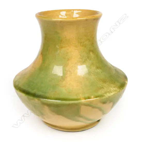 Crown Lynn Ambrico vase; mustard base with green overglaze. Pre-1948 stamp to base and stamped numbers. H.160mm. H