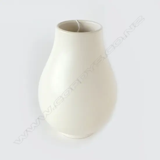 Crown Lynn uncommon shape Hand Potted vase -incised shape reference 'H6'. Of ovoid form with ring foot. Printed marks. H,230mm. Tiny chip to foot, faint crazing around rim & internally.