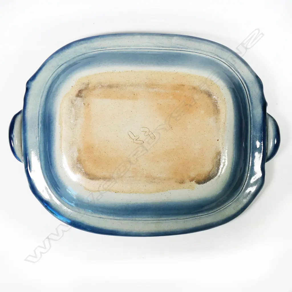 Merilyn Wiseman two handled dish with striking orange and blue glaze detail. 480 x 350mm. Image 1++