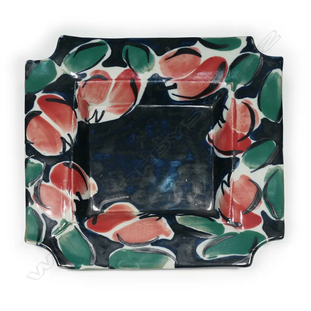 Raewyn Atkinson studio pottery squared dish; hand painted coloured glaze of red florals on blue. Signed and labelled. W.305mm. Image 1++