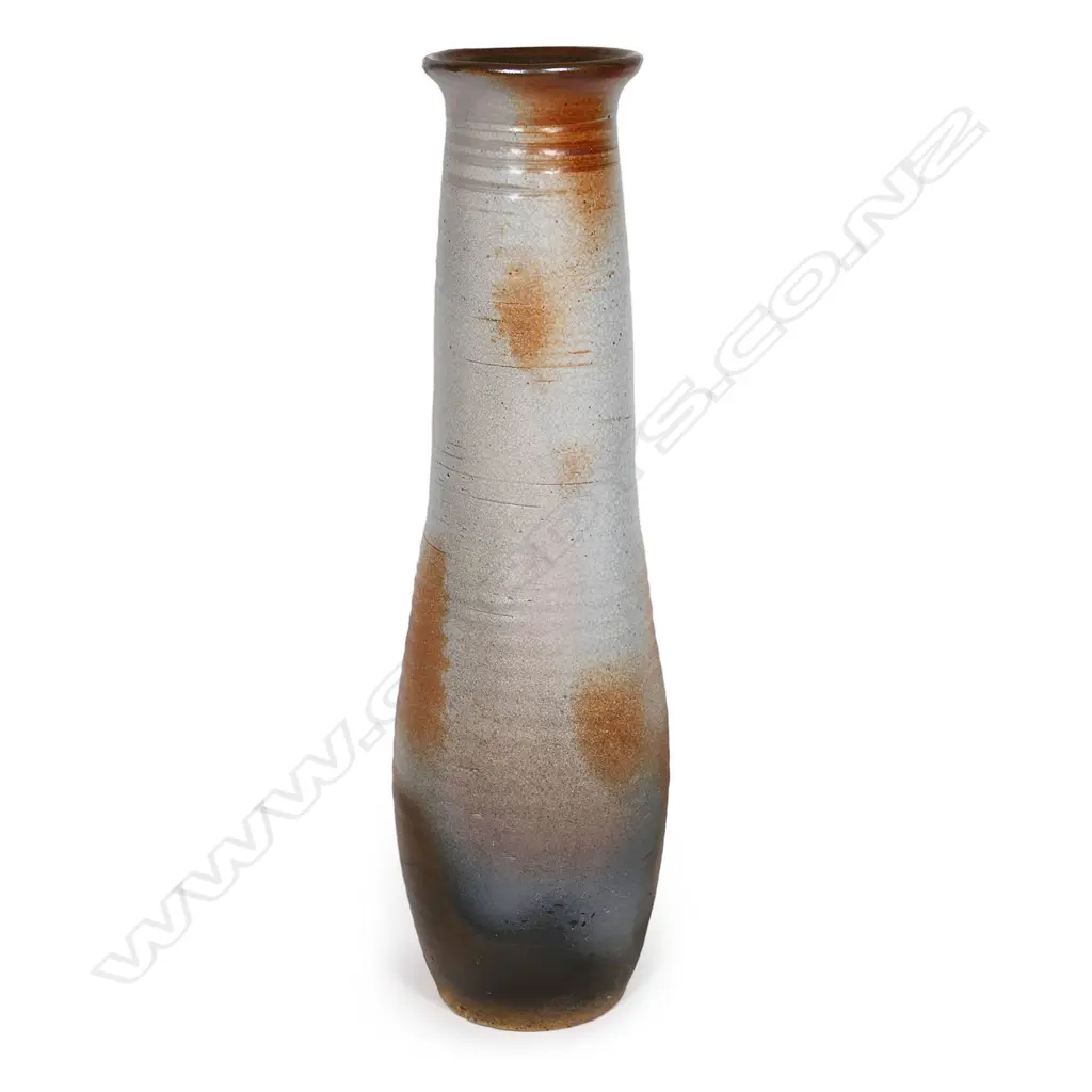 Ian Firth tall cylinder floor vase. A shino glazed cylinder floor vase with flared lip. Some minor losses to glaze. Potter's mark lower side. H.580mm. Image 1++