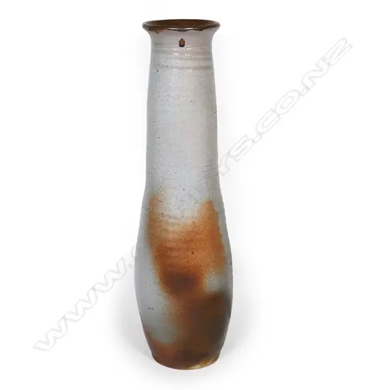 Ian Firth tall cylinder floor vase. A shino glazed cylinder floor vase with flared lip. Some minor losses to glaze. Potter's mark lower side. H.580mm.
