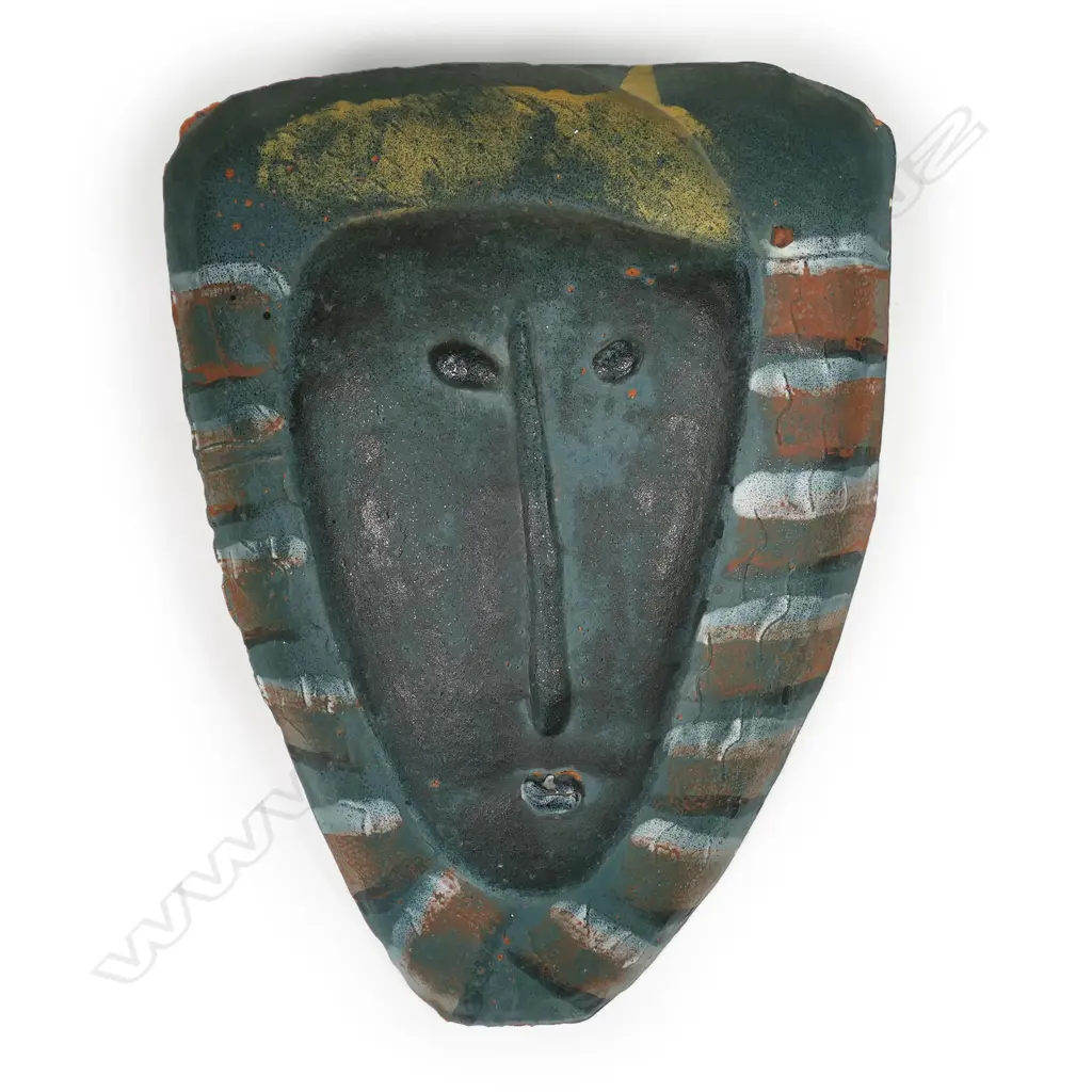 Steve Fullmer 'Head of Justice' wall shield; central facial features framed with matte glazed brushed strokes. Wall hanging attachments to rear. Signed. 520 x 380mm (tiny chip to glaze on outer rim) Image 1++