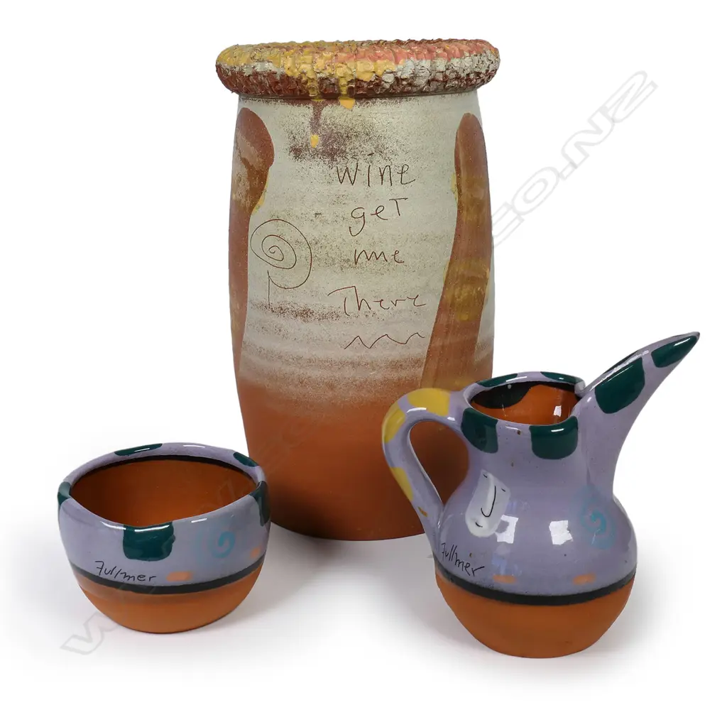 Steve Fullmer (Nelson) wine cooler, small jug and matching bowl - jug and bowl in vivid mauve glaze. Incised and glazed decoration, the jug with tall spout. Cooler H.235mm. Jug H.130mm. Vendor's note: Bought directly from the potter. Image 1++