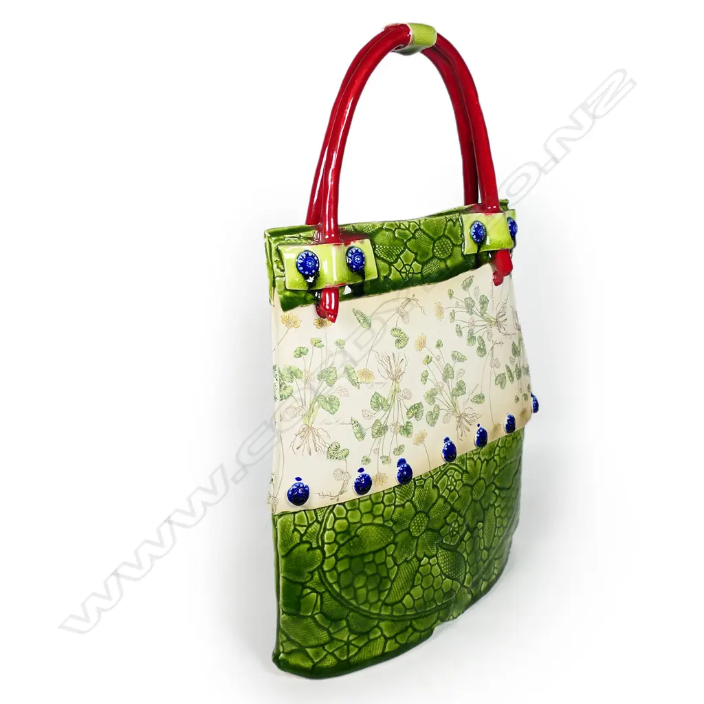 Katie Gold 'Handbag' finely decorated with plants 'Celandine' and green glazed impressed florals. Red handle. H.380mm. Vendor's note: Bought directly from the potter. Image 1++