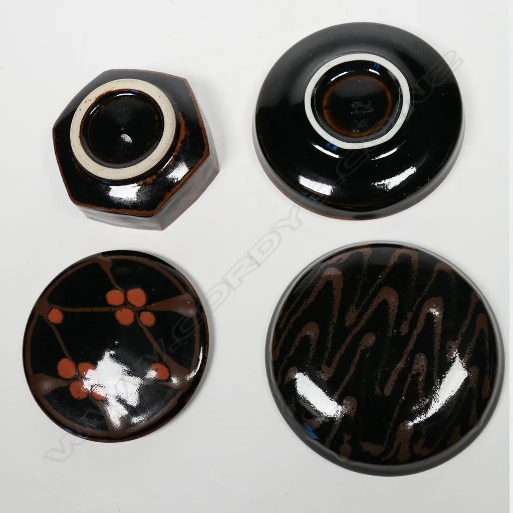 Peter Holmes two lidded trinket boxes with blossom and swirl design over lustrous black tenmoku glaze. Unmarked. Dia.105mm/95mm Image 1++