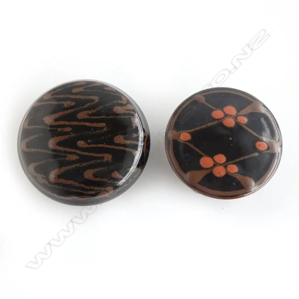 Peter Holmes two lidded trinket boxes with blossom and swirl design over lustrous black tenmoku glaze. Unmarked. Dia.105mm/95mm Image 1++