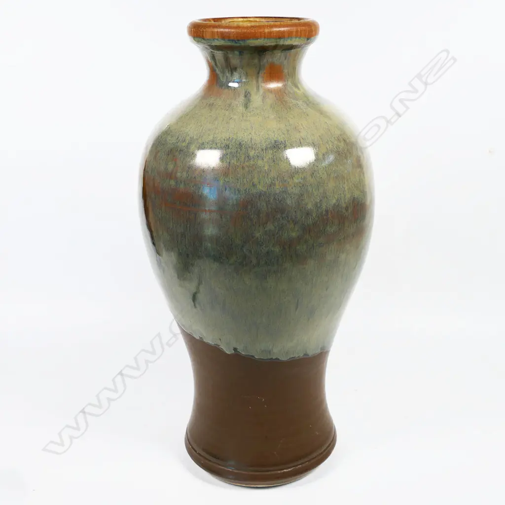 David Huffman tall baluster vase; high lustre glazed body. Potter's mark to base. H.330mm Image 1++