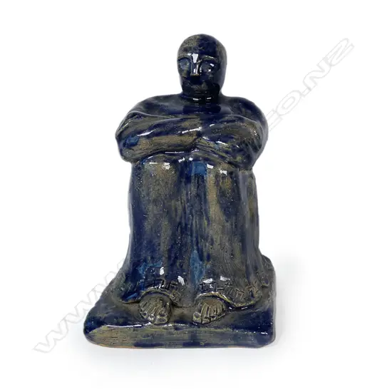 Jack Hutchinson (attributed) navy glazed seated man. An early example of New Zealand pottery. H.140mm