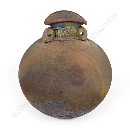 Mark James spherical vase; raku fired with altered mouth and lug handles. Earth tones with copper glaze highlights. Potter's stamp to base. H.165mm