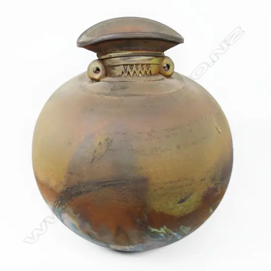 Mark James raku fired ovoid vase with a golden burnished exterior and 2 lugs on the flared neck. H.200mm