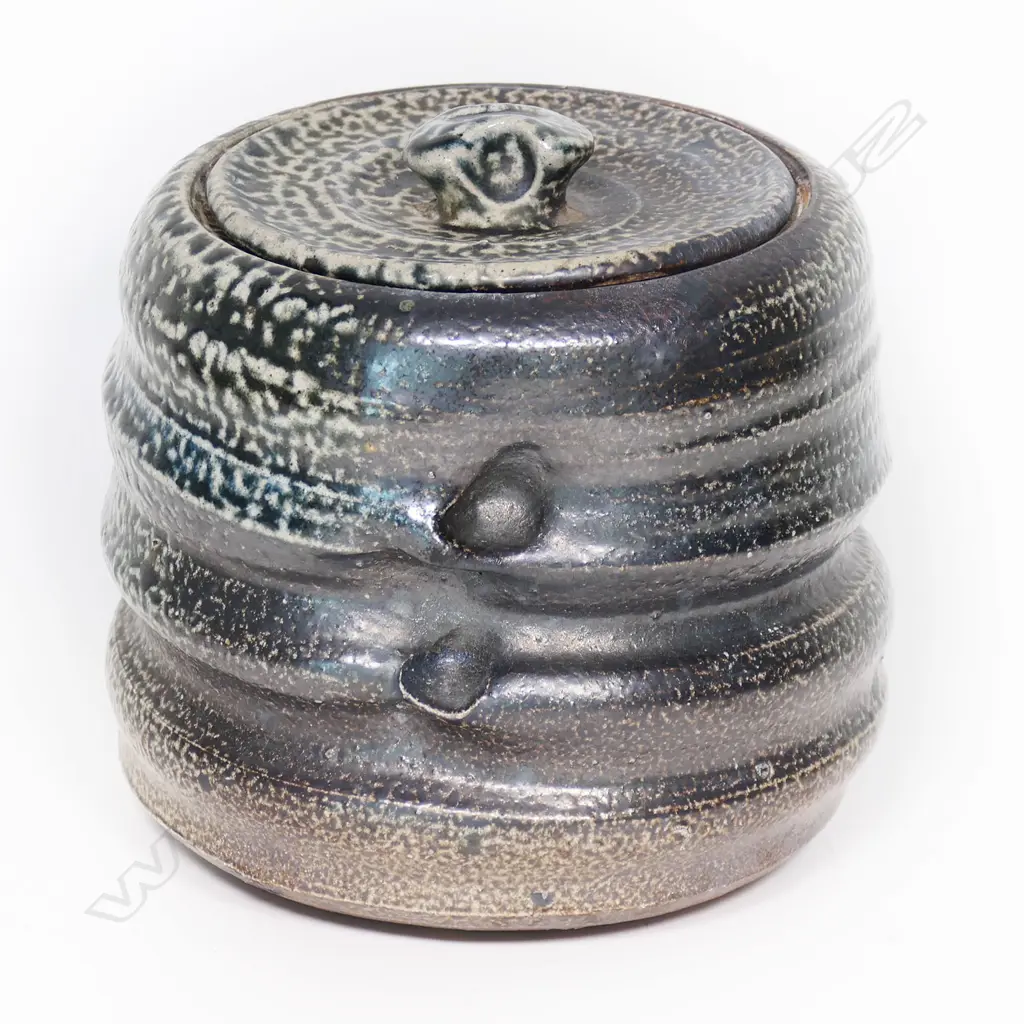 John Madden salt glaze pottery lidded jar dark blue cobalt glaze incised bands and dimples. H.175mm. Image 1++