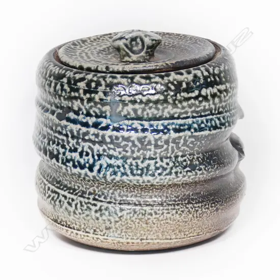 John Madden salt glaze pottery lidded jar dark blue cobalt glaze incised bands and dimples. H.175mm.