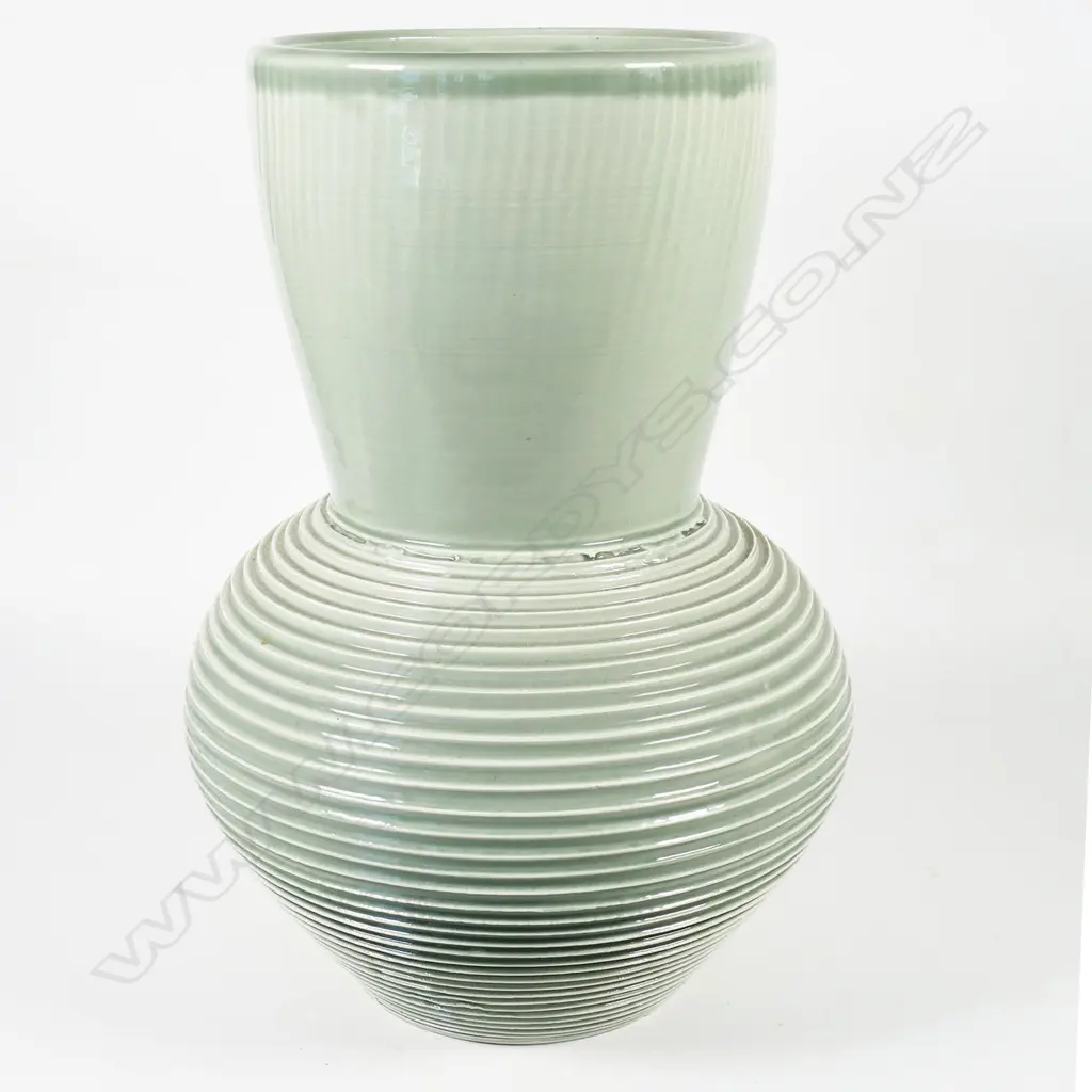 Ross Mitchell-Anyon (1954-1922) vase; celadon glazed lathe turned bulbous form with trumpet mouth, H.290mm Image 1++