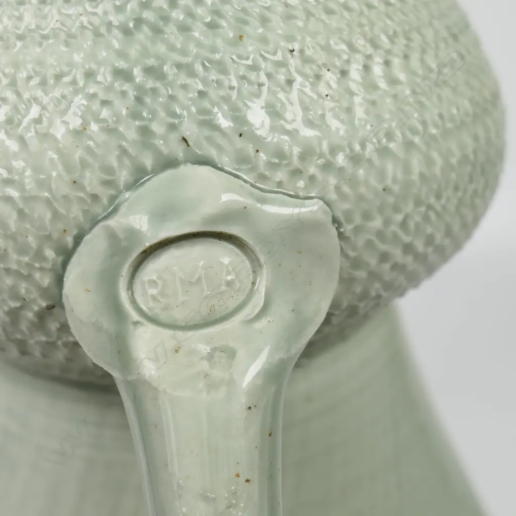 Ross Mitchell-Anyon (1954-2022) celadon glazed porcelain jug with textured body. Potter's mark at handle base. H.165mm. Image 1++