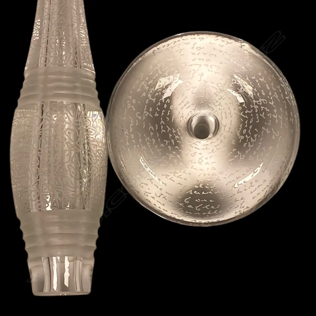 Lyndsay Patterson Glass five piece 'Token' set 'Never Been Touched' - c.2009, the mouth blown and engraved clear and black glass pieces of stylised pacific artefact forms, Pūtōrino (flute), Pōtaka tā (whip top), Mau kakī (reel necklace unit) and two māhē (sinker forms), Image 1++