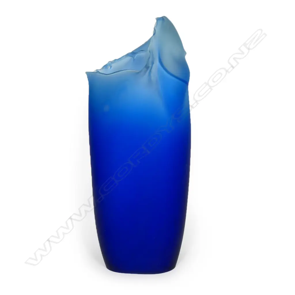 Garry Nash ONZM (1955-) exhibition art glass 'Introspection Poster Piece' from the important 'Bill Poster' series 1986. The graduating blue glass mildly tapered oval hollow section with applied white glass 'Bill Poster' featuring a gentleman at his desk, an extensive landscape with tree and distant town and an abstract section. Signed and dated '86. H.550mm, Image 1++