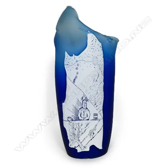 Garry Nash ONZM (1955-) exhibition art glass 'Introspection Poster Piece' from the important 'Bill Poster' series 1986. The graduating blue glass mildly tapered oval hollow section with applied white glass 'Bill Poster' featuring a gentleman at his desk, an extensive landscape with tree and distant town and an abstract section. Signed and dated '86. H.550mm,