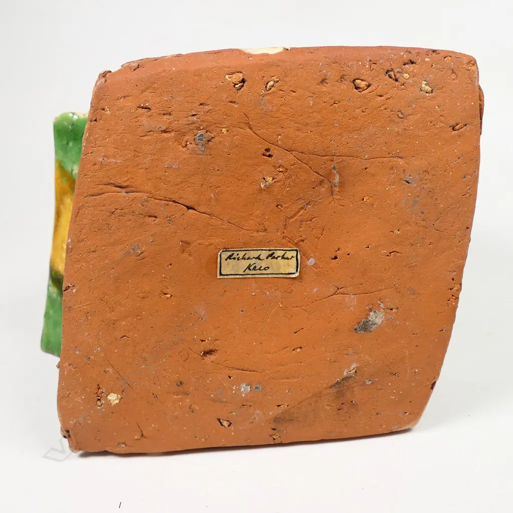 A large Richard Parker pottery vase; square baluster angular shape with quatrefoil mouth; with bands of caramel, green and pale glaze. Minor glaze frits. Artist's label to base. H.160mm. Image 1++