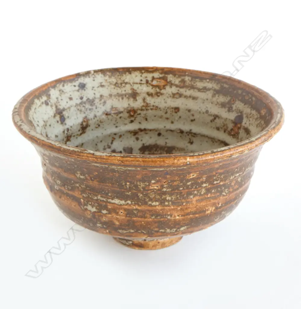 Jeff Scholes bowl with defined throwing marks and variable glaze of grey over rust brown. Stamped mark. Dia.175mm. Vendor's note: Bought directly from the potter. Image 1++