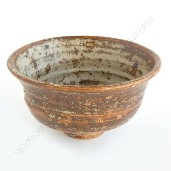 Jeff Scholes bowl with defined throwing marks and variable glaze of grey over rust brown. Stamped mark. Dia.175mm. Vendor's note: Bought directly from the potter.