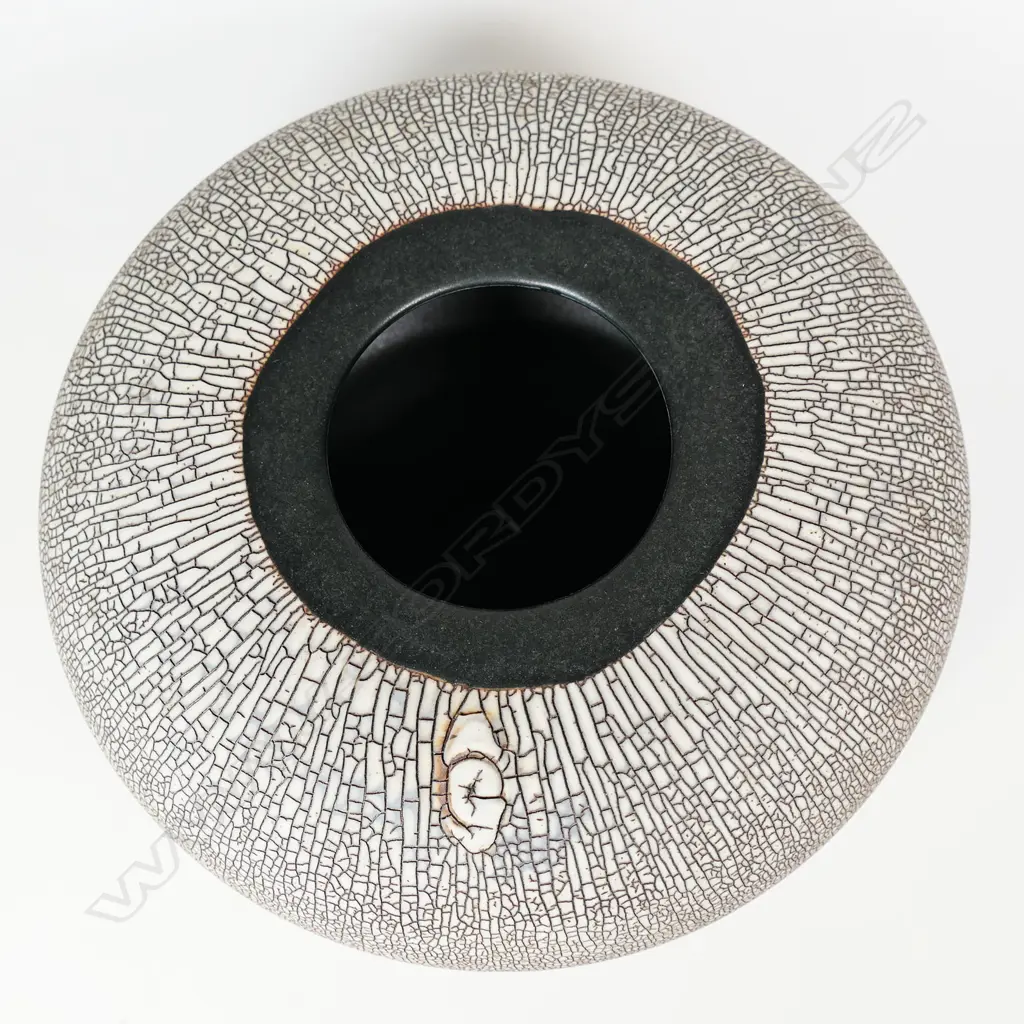 Peter Shearer orb vase with a pale crackled glaze finish and band of smooth glaze top and bottom. Initialled lower side, Dia.230 x H.120mm. Image 1++
