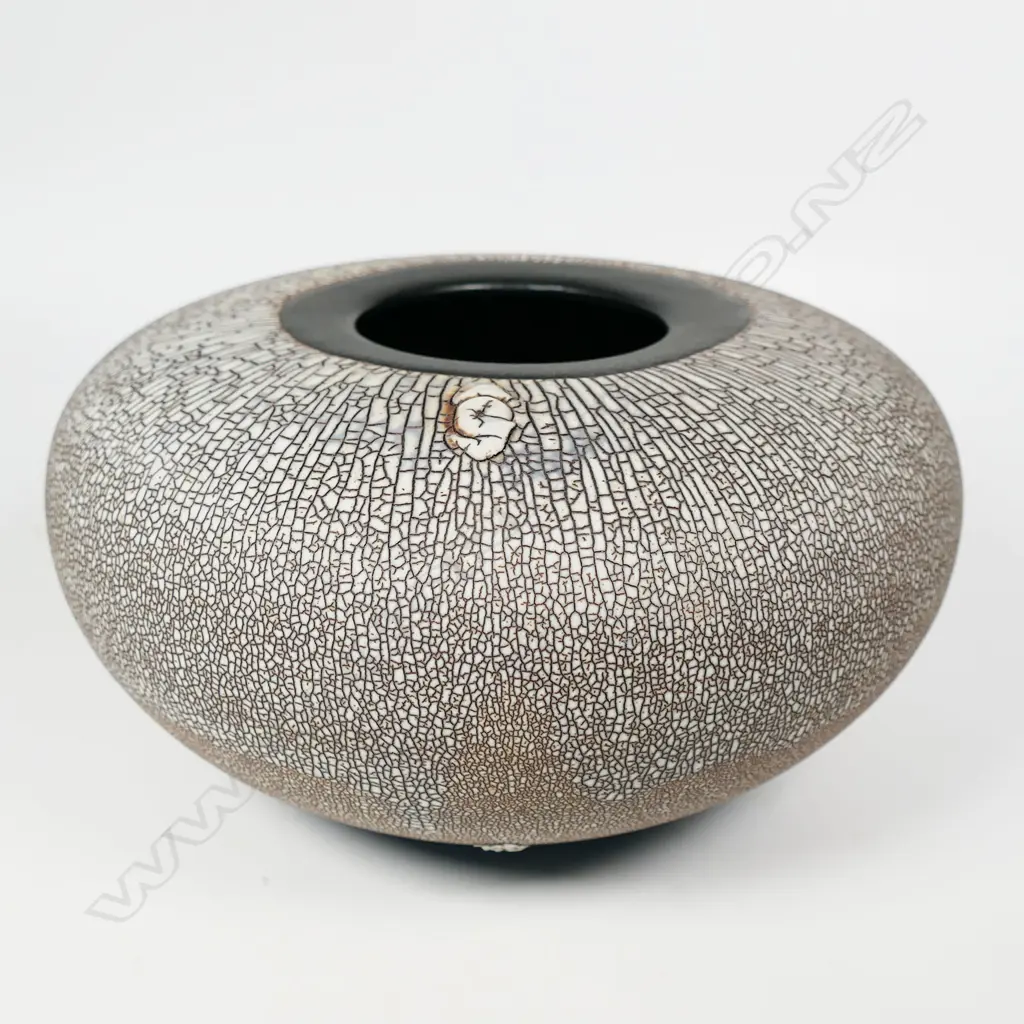 Peter Shearer orb vase with a pale crackled glaze finish and band of smooth glaze top and bottom. Initialled lower side, Dia.230 x H.120mm. Image 1++