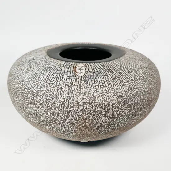 Peter Shearer orb vase with a pale crackled glaze finish and band of smooth glaze top and bottom. Initialled lower side, Dia.230 x H.120mm.