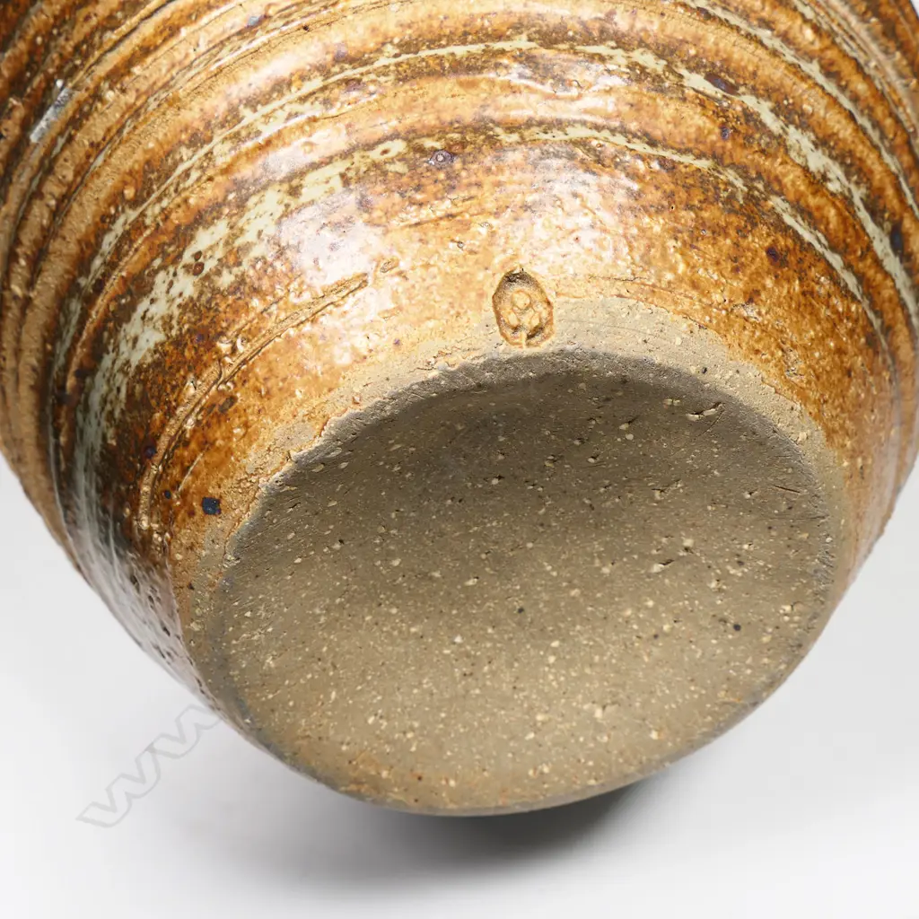 Warren Tippett vase with lathe turned linear circular design to body with soft celadon glaze highlights. H.260mm Image 1++