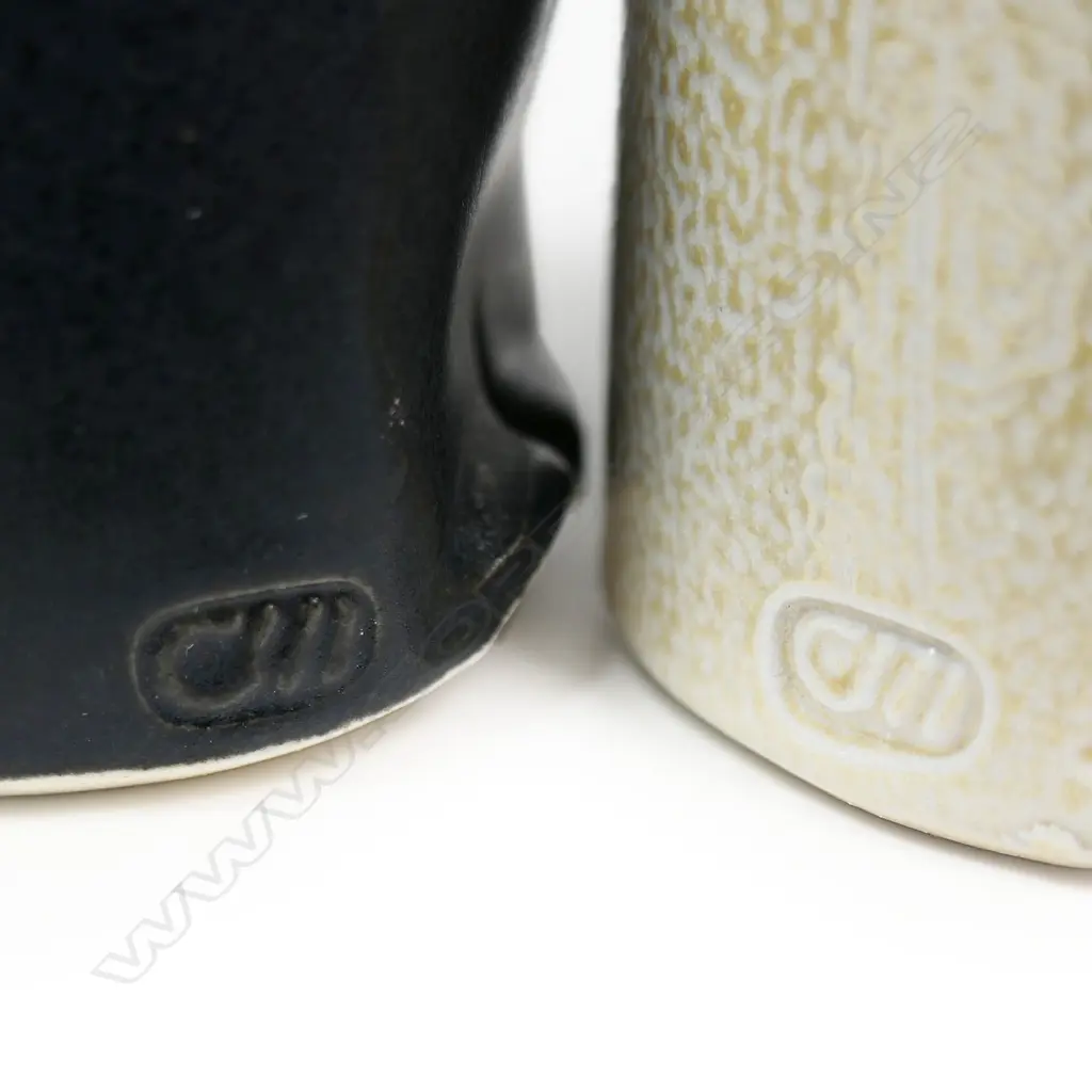 Chris Weaver three porcelain pieces; a black small pouring vessel and two small salt glazed vessels. Tallest H.135mm. Image 1++