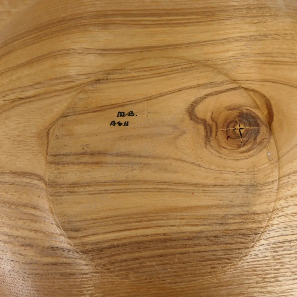 Mary Bartosw (Canterbury) turned and carved ash wood lidded box - the top and base rim of pagoda form. Initialled and inscribed to base 235 x 240 x 80mm. Image 1++