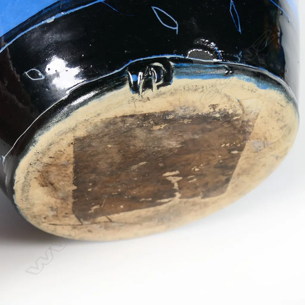 Andrew van der Putten large jug - glazed in vivid pastel colours with bird detail to spout. Stamped mark at the base. H.215mm Image 1++