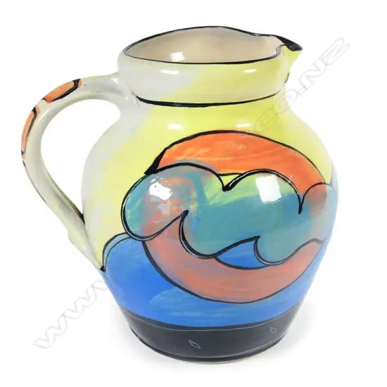 Andrew van der Putten large jug - glazed in vivid pastel colours with bird detail to spout. Stamped mark at the base. H.215mm